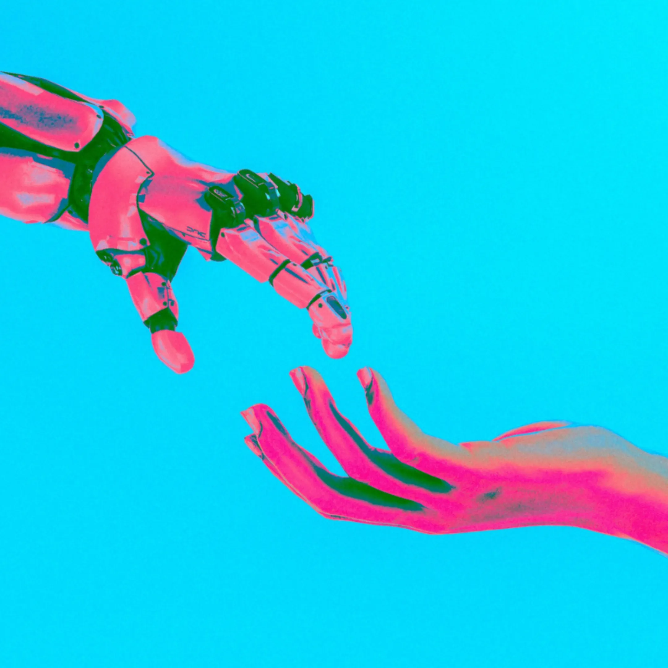 Symbolisches Bild für die Zukunft mit KI: Roboterhand greift nach menschlicher Hand